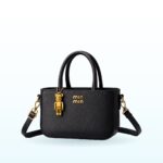 Black mini top-handle crossbody bag with gold bear charm – EB53